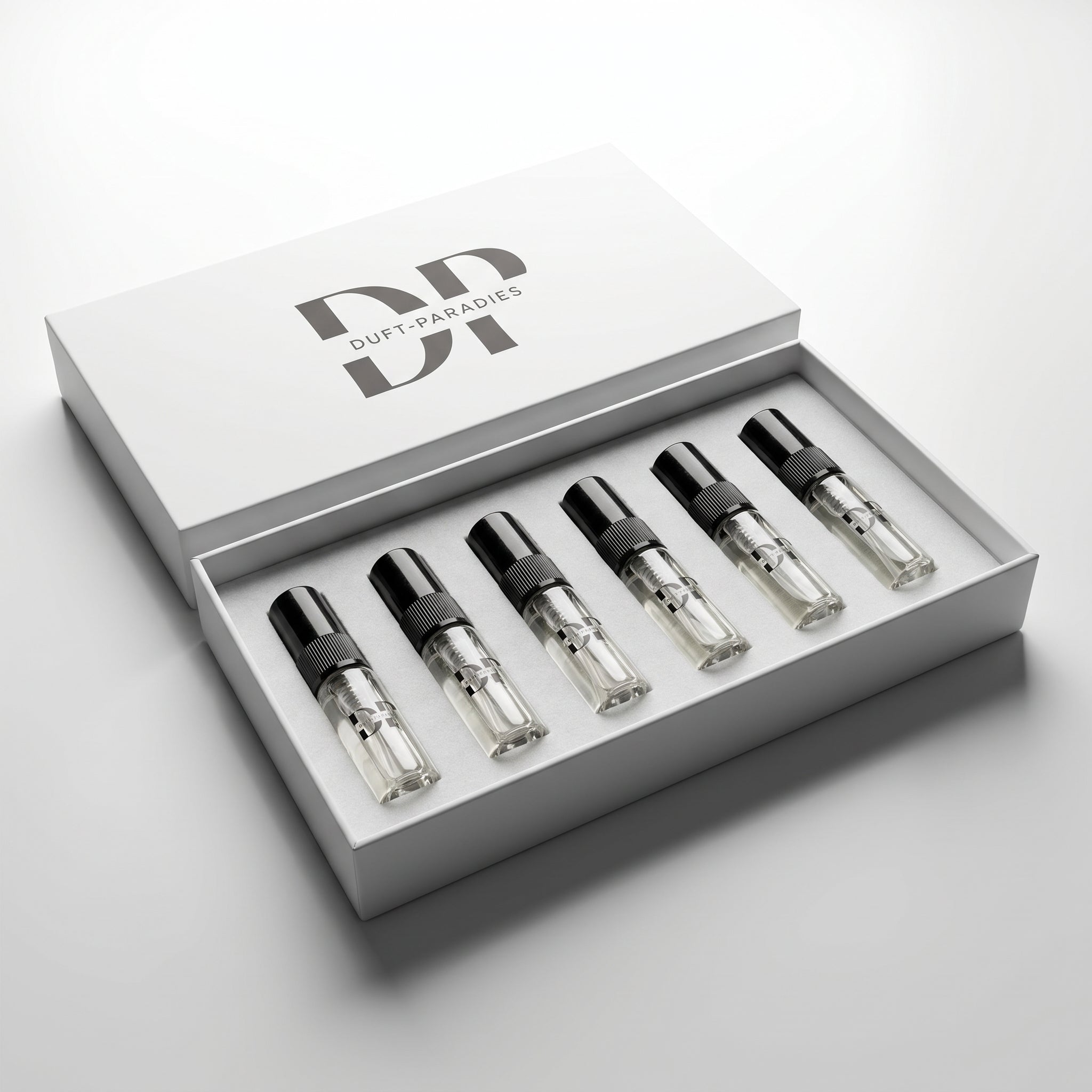 Duftparadies Tester-Set mit 6x 4ml Parfümproben auf weißem Hintergrund, ideal zum Testen verschiedener Düfte.